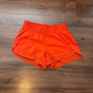 ATHLETA mesh racer shorts. Dark orange